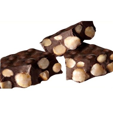Turrón artesanal de chocolate fondant con nueces de macadamia